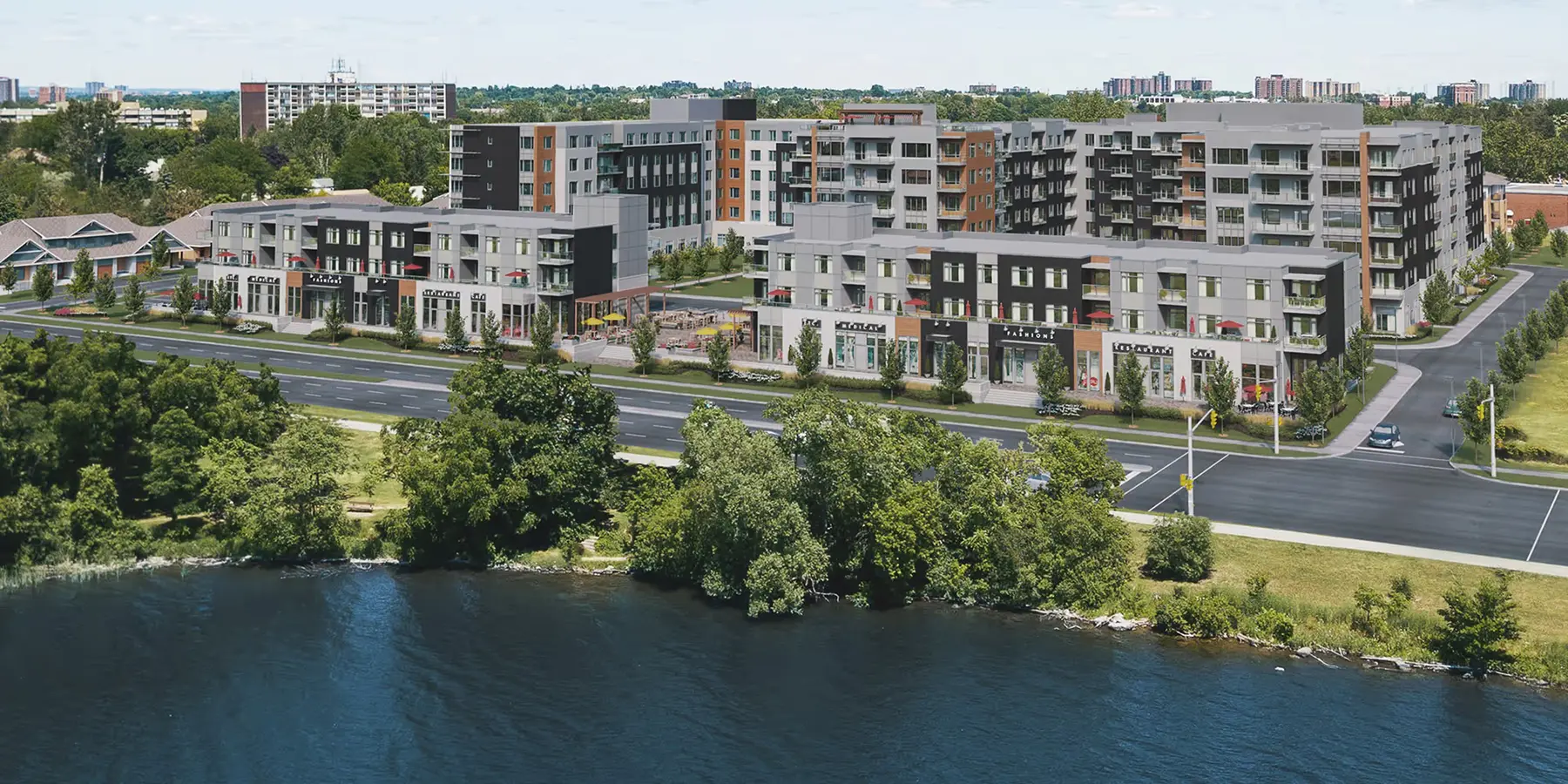 Aerial rendering of the 3071 Riverside Drive proposal in Ottawa: mid-rise condominium blocks with street-level retail along a boulevard beside the river.
