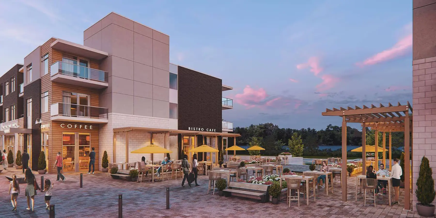 Dusk rendering of a courtyard plaza beside a coffee shop and bistro cafe, with yellow umbrellas, a timber pergola, outdoor tables and a river beyond.