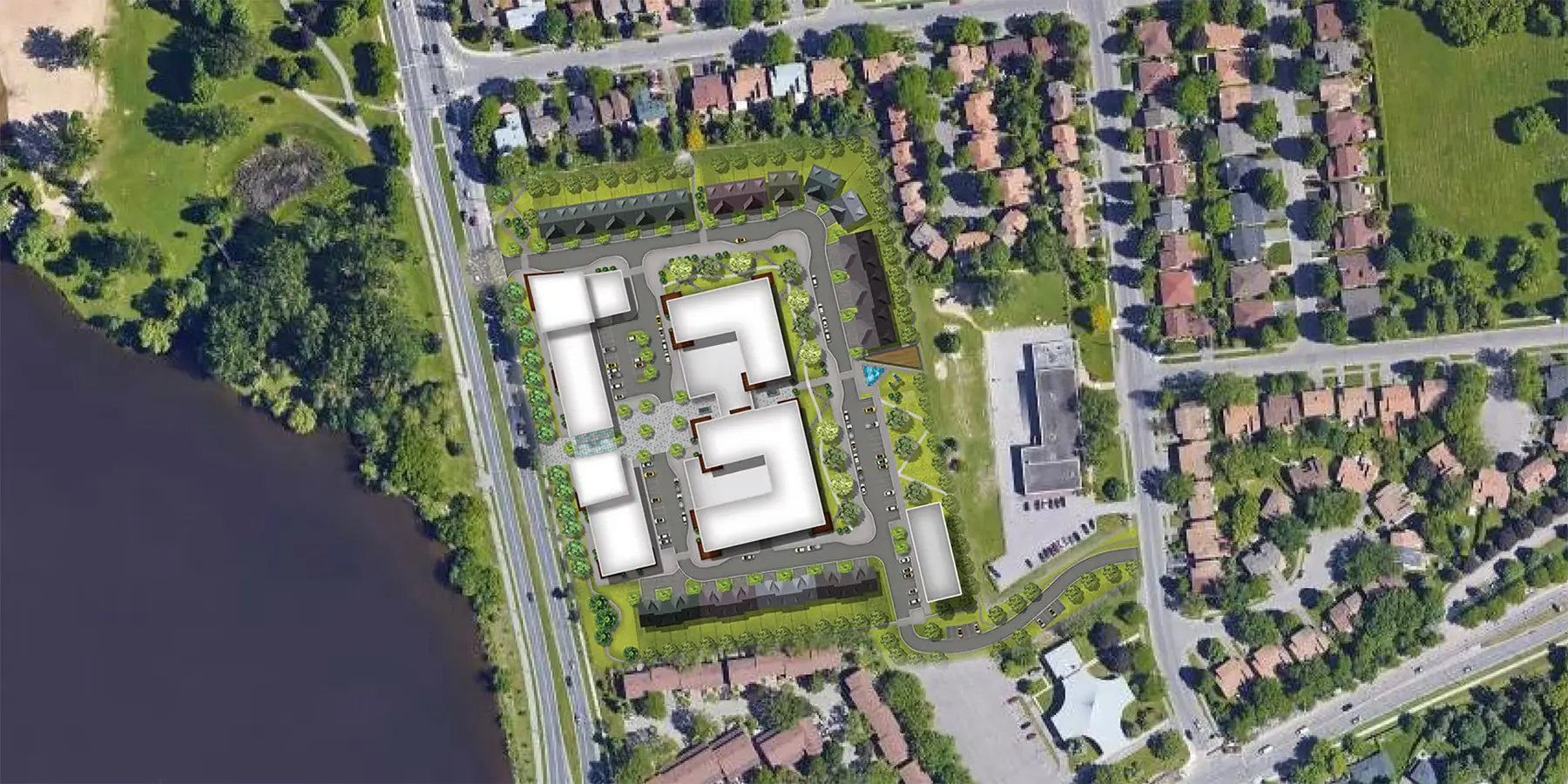 Aerial site plan of the townhouse and condo development beside the Ottawa River shoreline, showing apartment blocks, internal road loops and townhouse rows surrounded by existing houses.