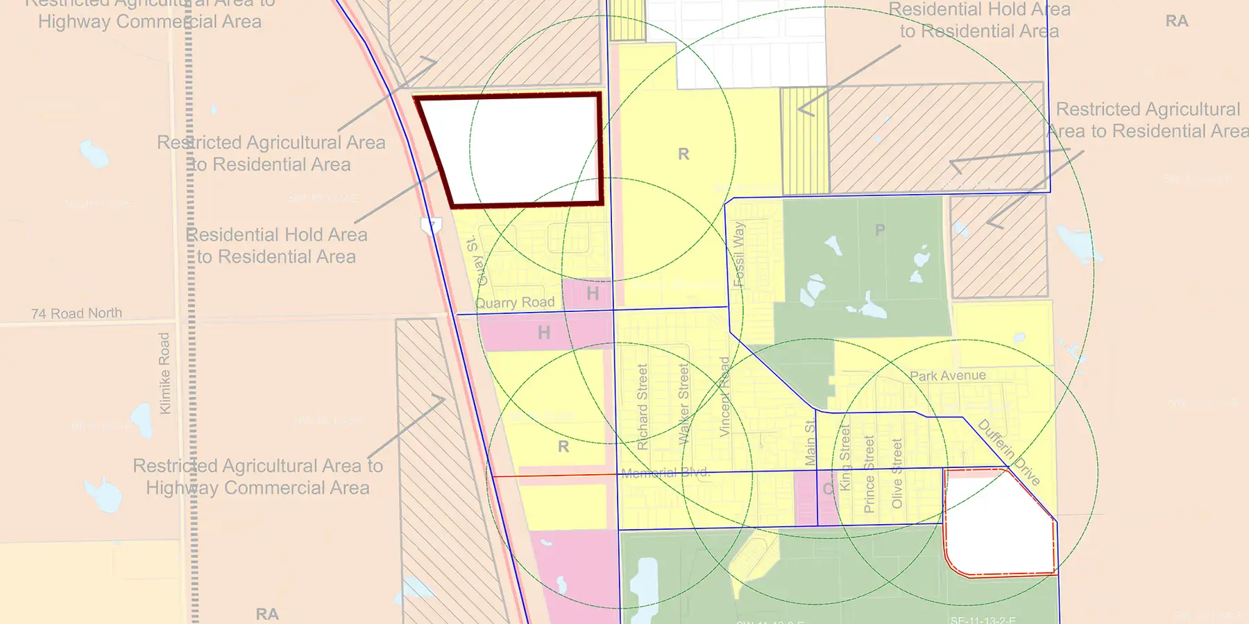 Zoning map of the Stony Mountain area with the project site outlined in dark red, showing land use changes such as restricted agricultural to residential and residential hold areas.